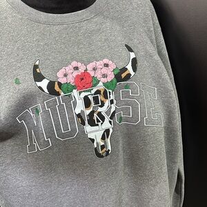 Pacific & Co. NURSE logo,cow skull w/flowers, pullover fleece lined sweatshirt